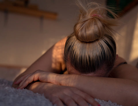 Young women affected by period discomfort that is affecting her mood.